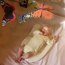 Baby watching the Butterfly Mobile
